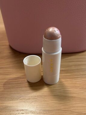 Merit Day Glow Dewy Highlighting Balm Color: Bounce - rose gold New